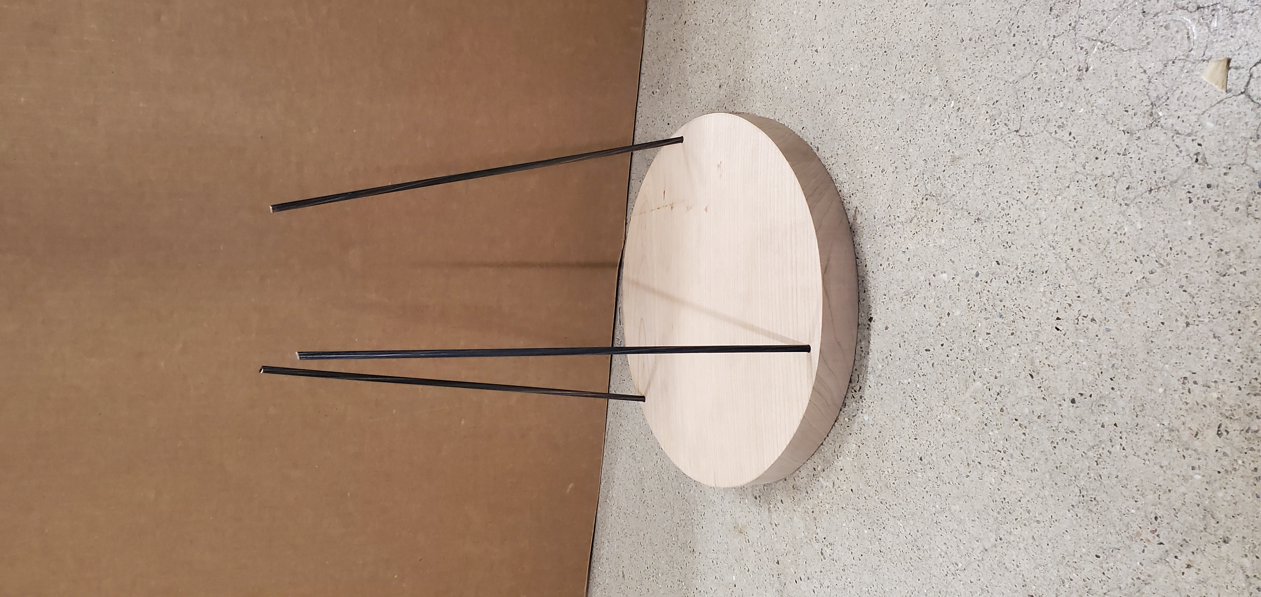 Wooden base with rods